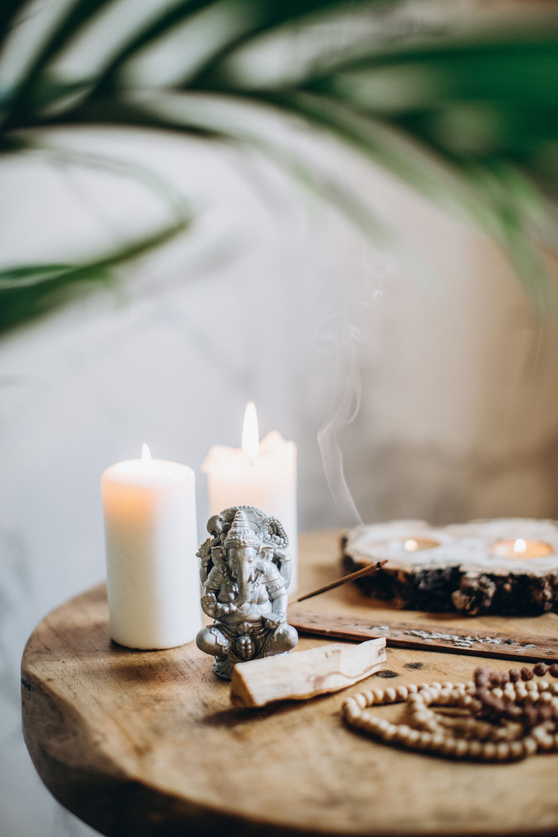 Candles and incense on a wooden table